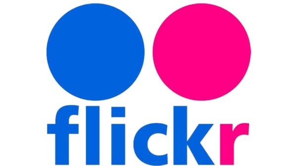 Flickr logo with two overlapping circles, one blue and one pink, above the word 