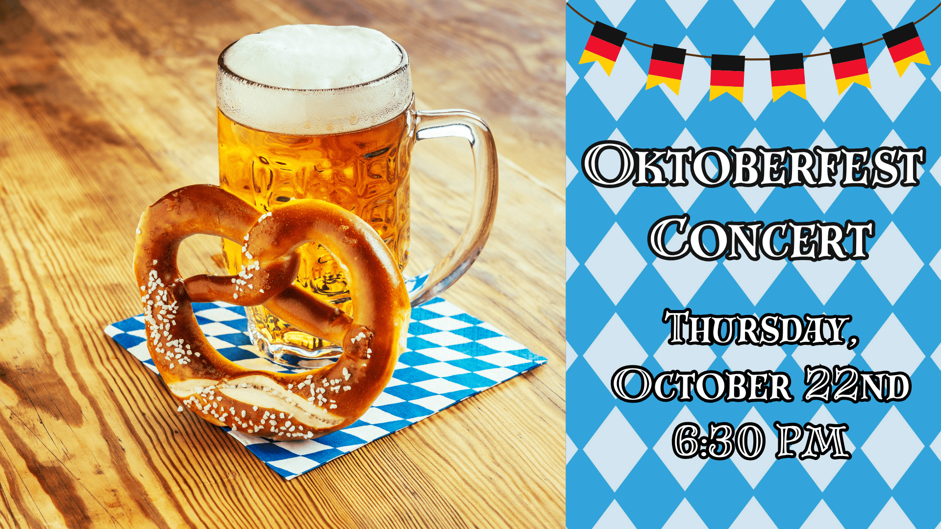 A beer stein and a salted pretzel on a blue and white checkered napkin next to a sign that reads: Oktoberfest Concert, Thursday, October 22nd, 6:30 PM.